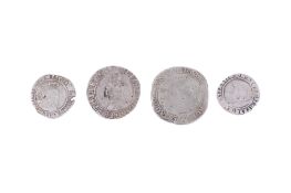 A group of four assorted hammered coins.