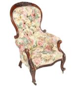 A late Victorian mahogany framed spoon and button back chair.