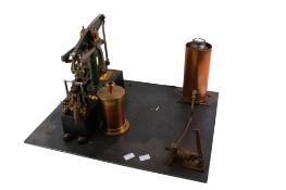 A Stuart Turner live steam model of a beam live steam engine and relevant paperwork.