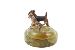 Two 20th century onyx pin trays with painted cast metal dogs, in the style of Bergman.