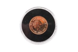 A 2020 sovereign coin. Cased, with Harrington & Byrne certificate card and pouch.