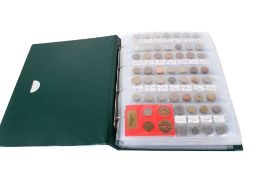 A well-filled album of 18th, 19th & 20th century World coins.
