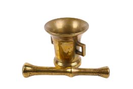 An early 20th century brass pestle and mortar.