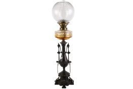 A Victorian oil lamp.