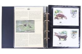 WWF Benham album of animal stamps in slipcase.