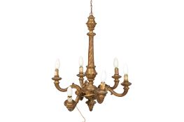 A carved giltwood chandelier.