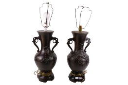 A pair of Japanese Meiji period bronze table lamps.