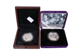 Two modern proof coins.