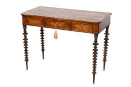 A late 19th/early 20th century inlaid rosewood writing table.