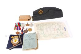 Four WWI medals and related items.