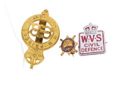 Three military and civil badges.