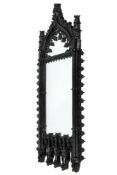 A large contemporary Gothic Revival rectangular wall mirror.