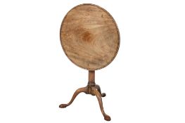 A Victorian mahogany tilt top table.