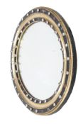 A 19th century Irish small oval wall mirror.