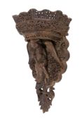 A Burmese Anglo-Indian large carved hardwood wall bracket.