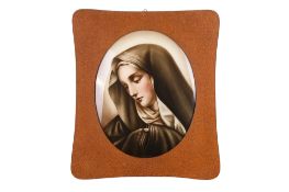 A vintage hand painted porcelain plaque.