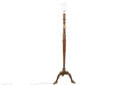 A Victorian mahogany standard lamp.