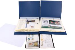 Two albums of First Day coin covers. Mainly Elizabeth II crown size, including one silver coin.