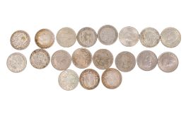 A collection of nineteen half crown coins, from 1912 to 1951.