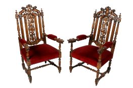 A pair of 19th century carved oak chairs of Carolean style.