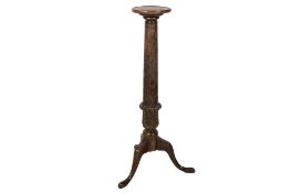 An Irish carved jardiniere stand.