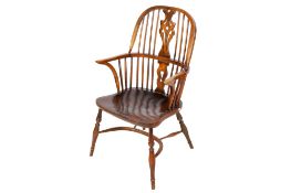 A 19th century oak hoop-back Windsor armchair.