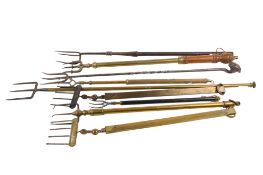 Nine 19th century and later toasting forks.