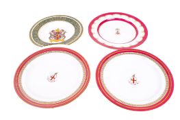 Four British armorial and commemorative plates.
