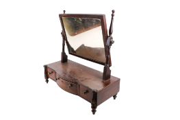 A Victorian mahogany veneered dressing table mirror.
