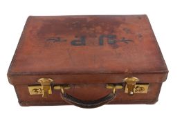 A Victorian small brown leather suitcase. Marked 'J.P.