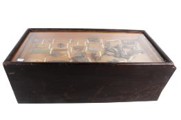 A 1940s group of military relics in a case.