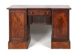 An antique twin pedestal sideboard.