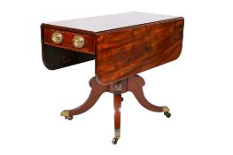 A Victorian mahogany drop leaf table.