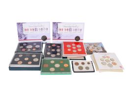 A collection of Royal Mint sets. Including four proof sets dated 1975, 1984, 1985 and 1993; three B.