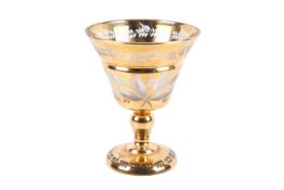 A Bohemian large gilt glass goblet.