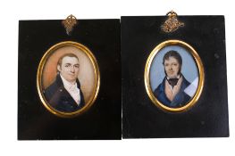 Two early 19th century oval portrait miniatures on ivory.