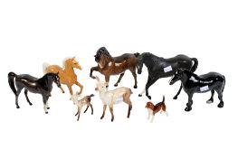 A collection of eight assorted Beswick figures mostly horses. Max.