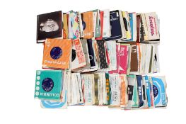 A collection of assorted 45 rpm vinyl 7 inch single records. Pop music from the 1950s onwards.