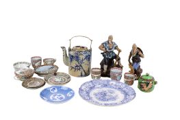 A collection of assorted oriental porcelain.