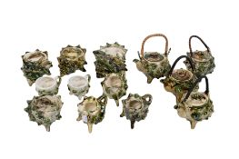 A group of novelty green conch seashell shaped teaware. Including tea pots, jugs and mugs, etc. Max.