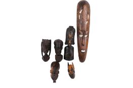 Six African tribal wood carvings. Including wall masks and busts. Max.