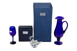 Three pieces of Bristol Blue Glass. Including a jug and a swan, two boxed. Max.
