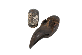 Two African tribal ceremonial carved wooden masks.
