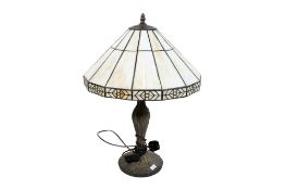 Tiffany style table lamp with a leaded glass shade.