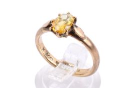 A 9ct yellow gold single stone ring.