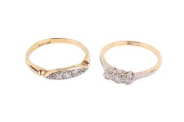 Two 18ct and platinum diamond rings. Set with single cut diamonds.