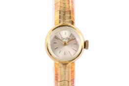 A vintage Zentra lady's gold watch. With gilt markers, case back marked 14Kt and 0.