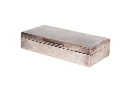 A wood lined silver cigarette box.