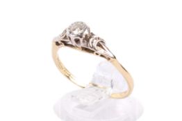 A single stone diamond ring. One round brilliant cut diamond of 0.