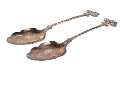 A pair of Victorian silver compote spoons.